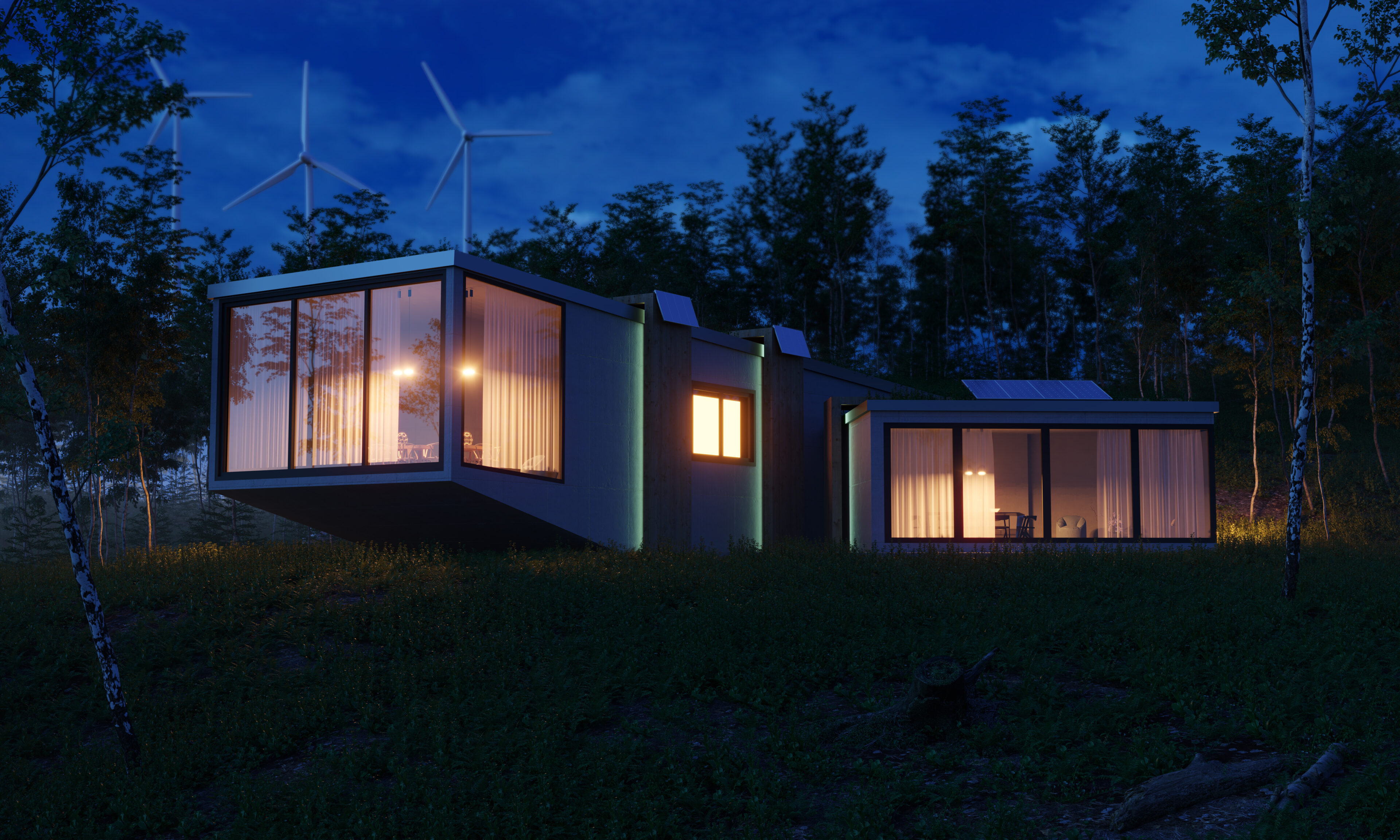 Modern house with wind turbines at night.