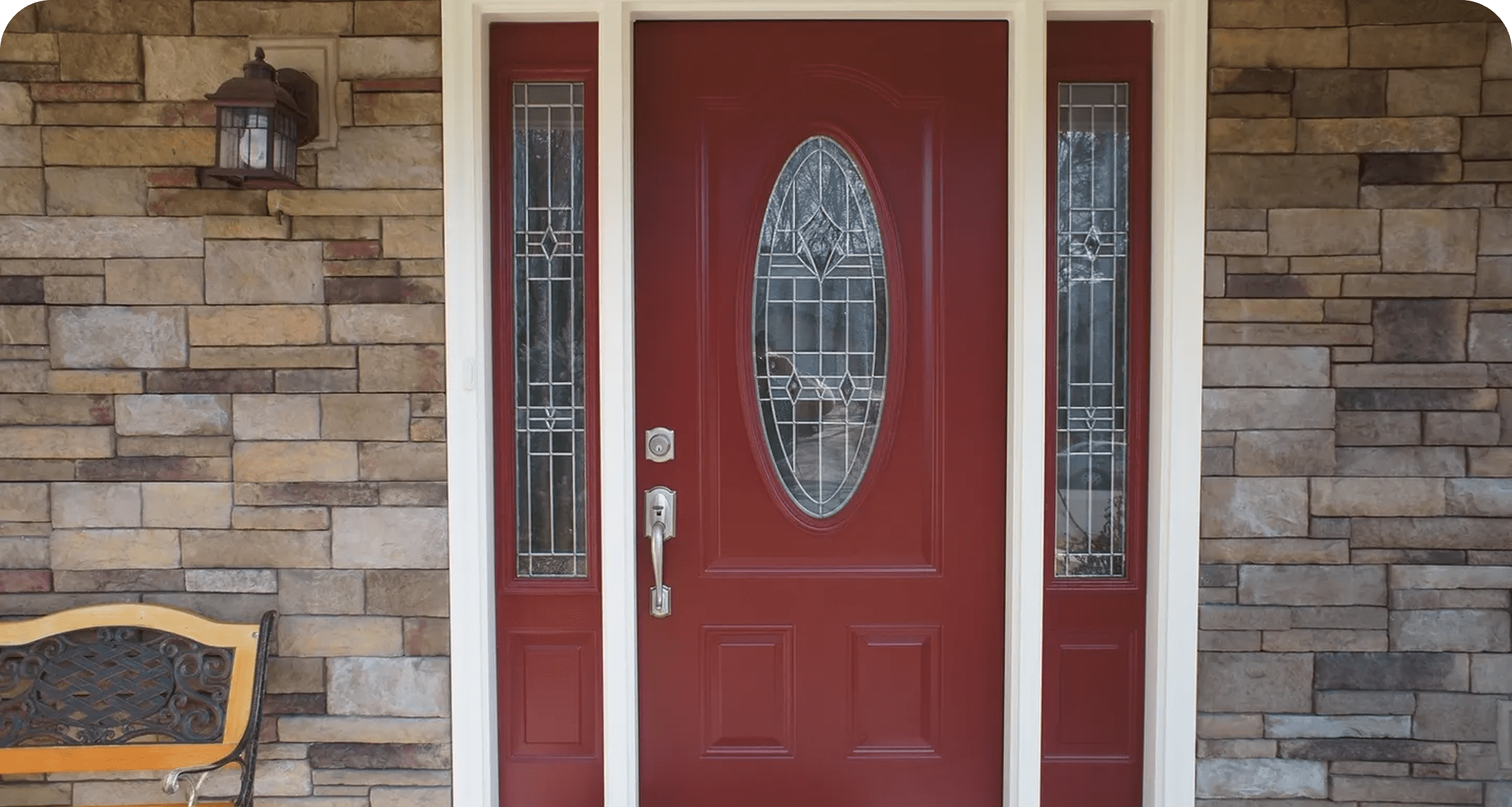 Red door with decorative glass panels.