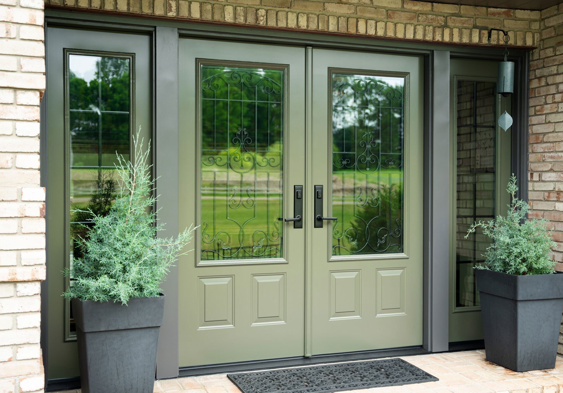 A pair of doors with glass windows on the outside.